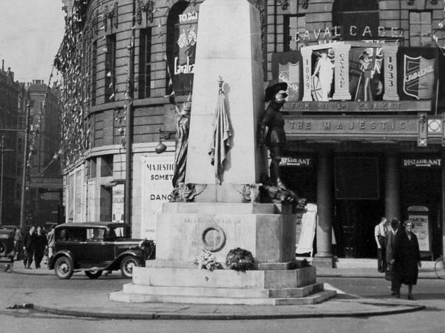 The Leeds War Memorial on City Square pictured in December 1935. Also pictured is the Majestic Dance Hall.