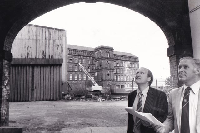 Steve Cranmer, left, of Leeds City Council's urban development unit, and Coun Bryan North, chair of the urban development committee, inspect the Balm Road/Beza Road  industrial redevelopment area. Pictured in May 1984.