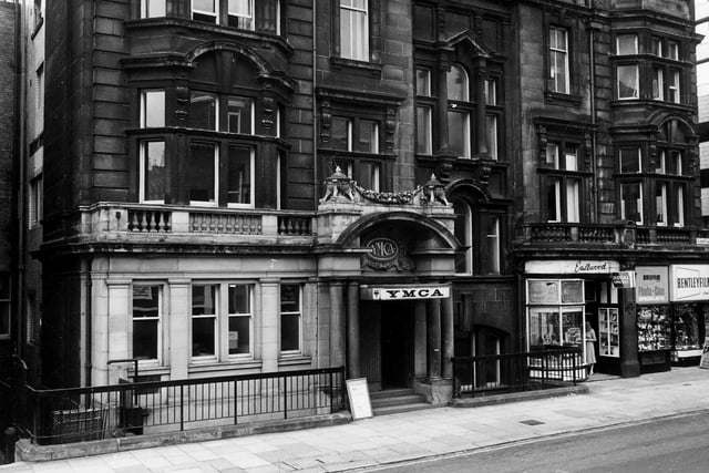The YMCA building on Albion Place, which was built on the site of the former Stock Exchange building and was officially opened in February 1908. It cost £50,000. It was used as the YMCA until 1984. Shops on the ground floor of the building are Eastwood tobacconist and Bentley Films photographic equipment.