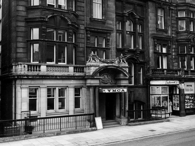 The YMCA building on Albion Place, which was built on the site of the former Stock Exchange building and was officially opened in February 1908. It cost £50,000. It was used as the YMCA until 1984. Shops on the ground floor of the building are Eastwood tobacconist and Bentley Films photographic equipment.