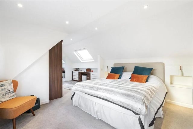 To the second floor is a large master bedroom with en-suite facilities.