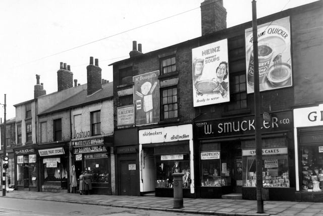 The south east side of North Street in April 1955. Shops in focus are W. Smuckler, provisions, shirtmakers of distinction, G. Lewis fitted carpets, S&G General Stores, Modern Meat Stores and S. Black Carpets.