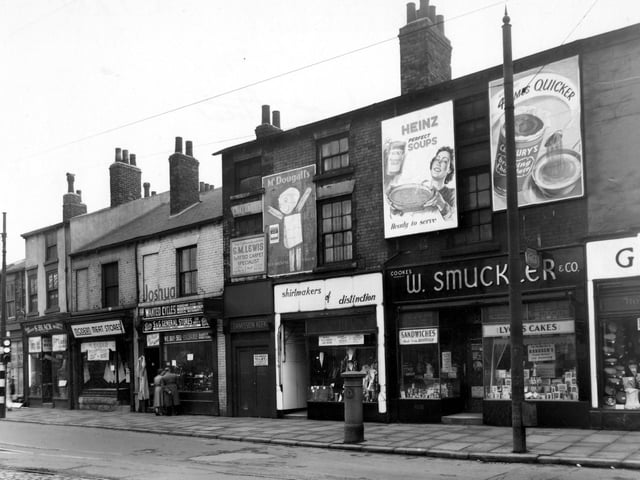 The south east side of North Street in April 1955. Shops in focus are W. Smuckler, provisions, shirtmakers of distinction, G. Lewis fitted carpets, S&G General Stores, Modern Meat Stores and S. Black Carpets.