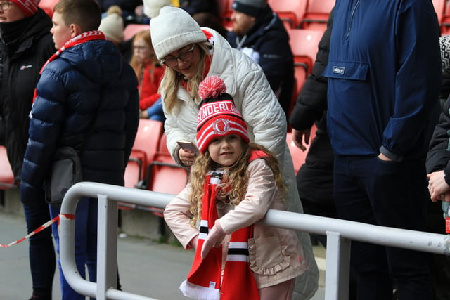 A young Sunderland fan waits for the game to start at the Stadium of Light