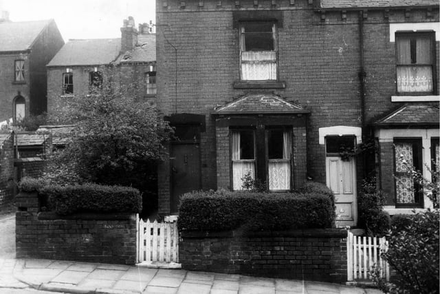 Two through terraced at the end of the row on Greenmount Terrace in May 1971 with small front gardens and ground floor bay windows.