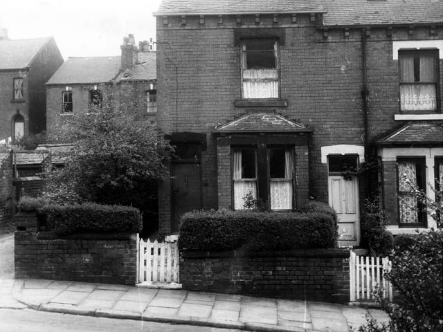 Two through terraced at the end of the row on Greenmount Terrace in May 1971 with small front gardens and ground floor bay windows.