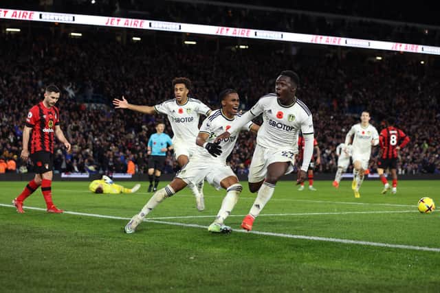 LEEDS, ENGLAND - NOVEMBER 05: Crysencio Summerville (C) celebrates the winning goal with Wilfried Gnonto and Tyler Adams of Leeds United during the Premier League match between Leeds United and AFC Bournemouth at Elland Road on November 05, 2022 in Leeds, England. (Photo by Marc Atkins/Getty Images)
