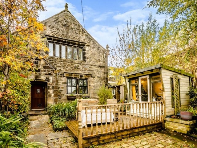 The rear of the property also has exceptional views, with a summerhouse.