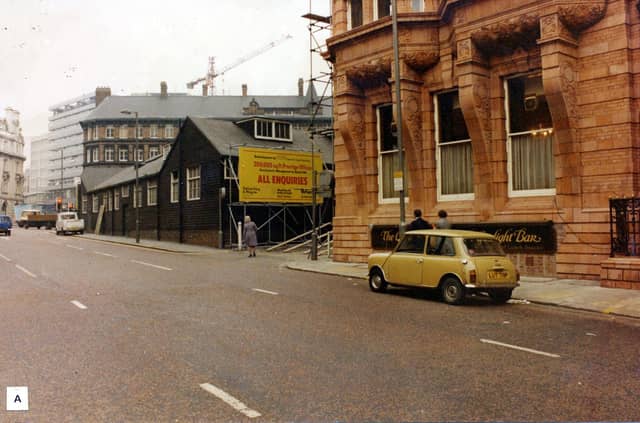 King Street looking towards East Parade in April 1979. The Hotel Metropole is in the foreground right. It stands on the site of the Fourth White Cloth Hall and opened on June 28, 1899. The Metropole was designed by architects Chorley and Connon in brick and terracotta. Quebec House on Quebec Street is the terracotta building in the background.