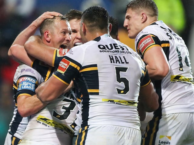 Try scorer Danny McGuire celebrates his try with his Leeds Rhinos team-mates.