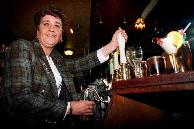 This is barmaid Jackie Mudd who could remember some 1,500 drinks requester by customers at The Middleton Arms. Pictured in February 1997.