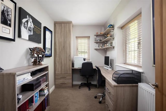 There is a home office which could also be converted into a sixth bedroom
