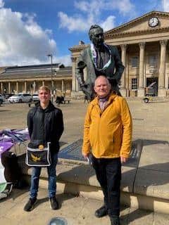 Cllr Andrew Marchington (right) visiting MVM's street stall
