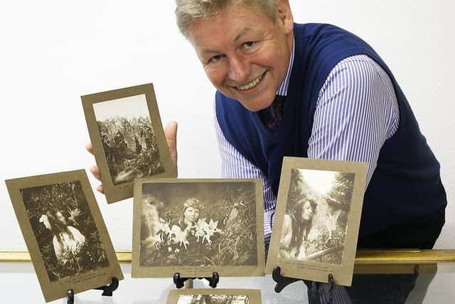 Auctioneer James Laverack with the Fairies photographs that lay unrecognised in a drawer for almost a hundred years