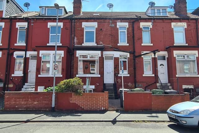 This two bedroom terraced house on Compton Row is for sale.