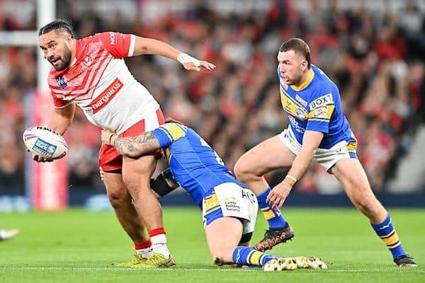 Konrad Hurrell of St Helens is tackled by Rhinos' Liam Sutcliffe in the Grand Final. Picture by Will Palmer/SWpix.com.