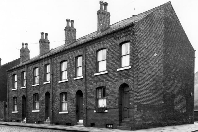 A block of four back-to-back houses on the end of Strawberry Mount in June 1965. This view looks from Strawberry Road