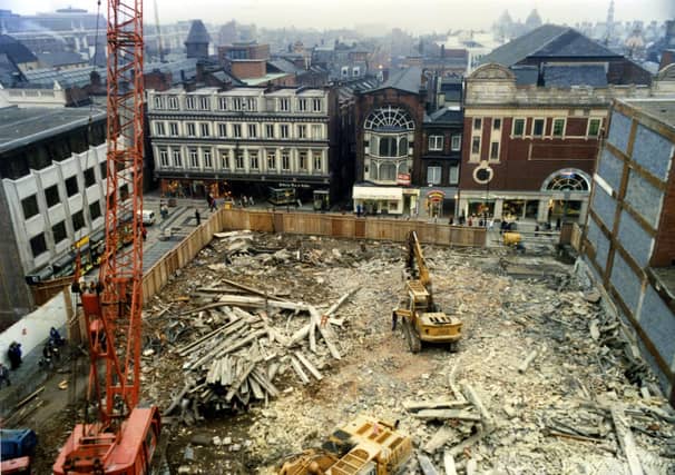 View onto the site where the 1962 Schofields store had recently been demolished. It was to be replaced by the Schofields Centre, a retail development incorporating a smaller Schofields store. Across the background Lands Lane is visible, a shopping street which runs between The Headrow and Commercial Street. The old white buildings in the background number 28 and 30 Lands Lane and is Grade II listed.