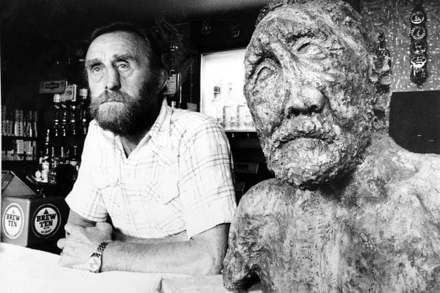 July 1976 and Ted Carroll, the TV and film extra with the 180 degree nose, is learning to live with himself at his pub in Ilkley. The new Ted, with the old nose, is a bronze bust modelled by a sculptress at Ilkley College. In fact Janet Bowler's Ted Carroll is even more rugged than the real thing. Ted let his nose go its own way after having it broken four times during his 12 years with Hunslet Rugby League Club. "She left it over the holidays with me to see if I could get used to it. People come up to it and order two pints", said Mr. Carroll, who with his wife, Beryl, ran the Rose and Crown, opposite Ilkley Parish Church.