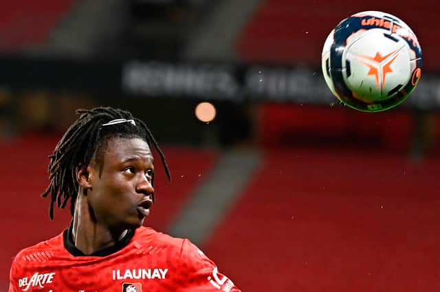 Rennes' French midfielder Eduardo Camavinga eyes the ball during the French L1 football match between Stade Rennais Football Club and FC Lorient at the Roazhon Park stadium in Rennes, northwestern France on February 3, 2021.
