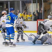 THE JOY AND THE DESPAIR: Oli Endicott (hidden) scores the winning goal in the 58th minute against Hull Seahawks on Saturday night. Picture courtesy of Neil Mickleburgh/Knights Media.