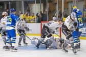 THE JOY AND THE DESPAIR: Oli Endicott (hidden) scores the winning goal in the 58th minute against Hull Seahawks on Saturday night. Picture courtesy of Neil Mickleburgh/Knights Media.
