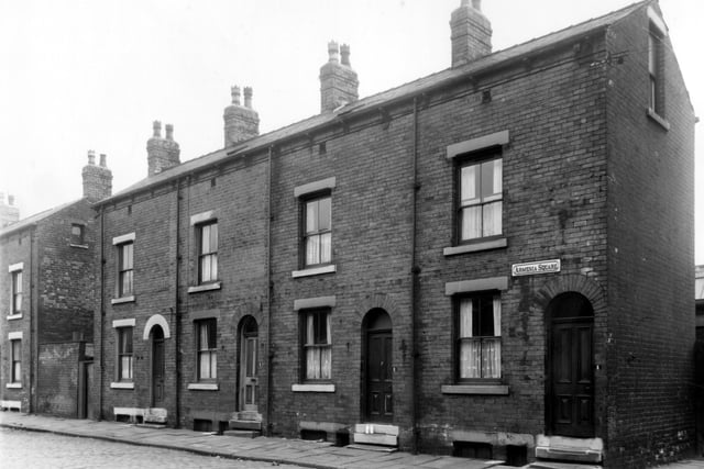 Armenia Square was an L-shaped road. These houses backed onto industrial premises on Roseville Road. Included in slum clearance for the Roundhay Road area. Pictured in June 1961.