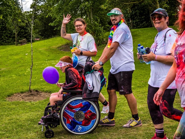 A family join the fun  at Forget Me Not children's hospice Colour Run June 14th 2025 (photo credit Mike Robinson)