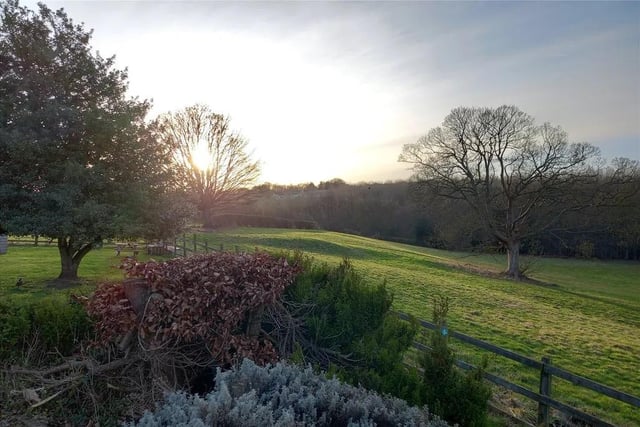 THe property offers extensive grassed areas which adjoin fenced paddocks and countryside beyond.