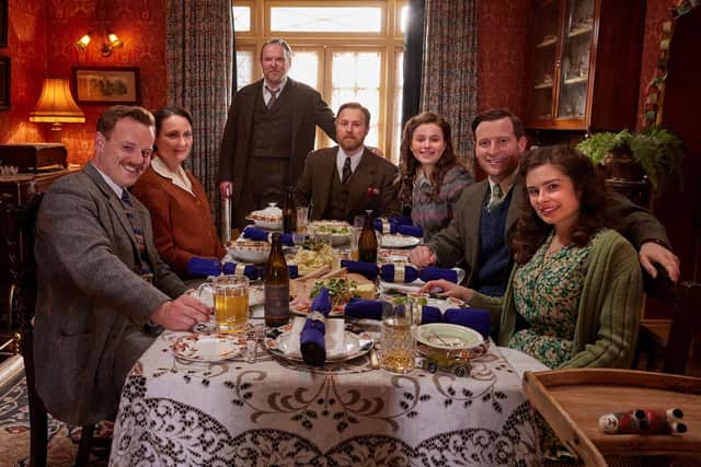 L-R, Tristan (Callum Woodhouse), Mrs Hall  (Anna Madeley), Richard Alderson (Tony Pitts), Siegfried (Samuel West), Jenny (Imogen Clawson), James (Nicholas Ralph), and Helen (Rachel Shenton) in the All Creatures Great and Small Christmas Special 2024. Picture: Helen Williams/Channel 5/Playground