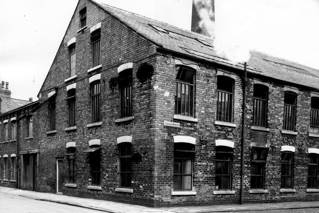 A view of the junction of Bewerley Street and Ashford Street showing the red brick constructed premises of Quebec Mills. This is where the twine manufacturers, William Waite, Sons and Atkinson (1922) Ltd are located. Pictured in June 1964.