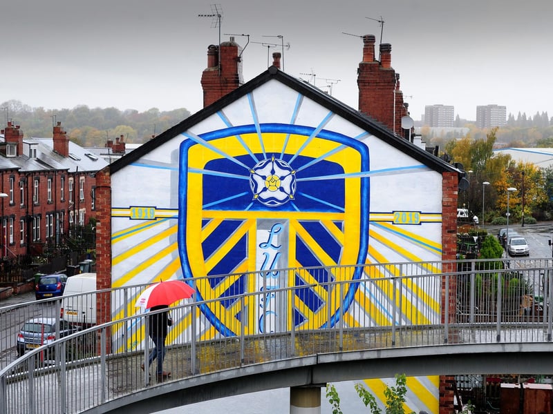 Painted by Shane Green, from Otley, the huge Leeds United badge artwork spans two end-terraces on Tilbury Mount in Holbeck, on the way to Elland Road stadium.