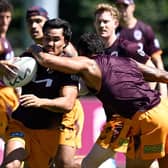 New Wakefield Trinity signing Mason Teague is tackled during a Brisbane Broncos NRL training session in February. Picture by Bradley Kanaris/Getty Images.