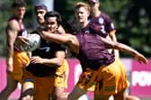 New Wakefield Trinity signing Mason Teague is tackled during a Brisbane Broncos NRL training session in February. Picture by Bradley Kanaris/Getty Images.