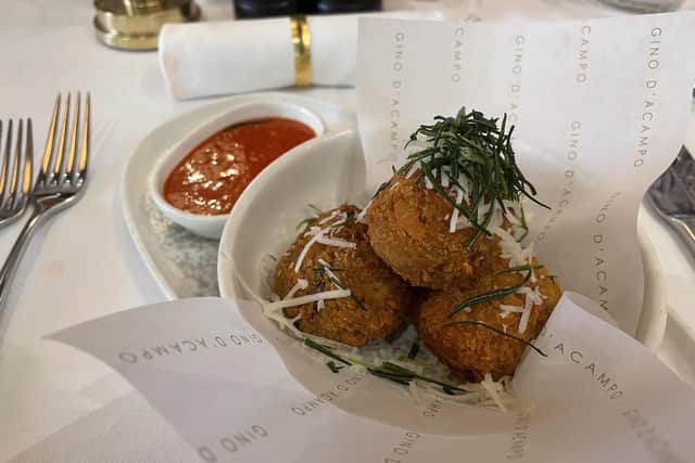 The arancini ai funghi satisfied a craving for something deep-fried and fatty.