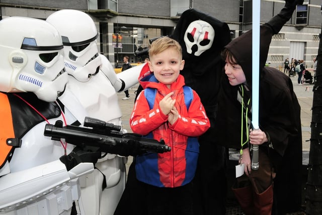 Going down a storm....Dexx Bridges, three, of Pontefract meets Star Wars characters. (pic by Steve Riding)