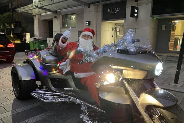 'Mystery Santa' in his trike. (Pic credit: Garry 'Mystery Santa')