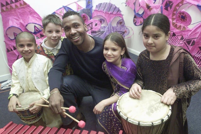 The Stephen Lawrence Awards in Leeds. Leeds United's Lucas Radebe (centre) pictured with pupils of Shakspeare School, Leeds after they won the Stephen Lawrence award.  Left to right : Imran Mohammed, Dale Bilbey, Sameena Farnell and Rafiyana Rasid.