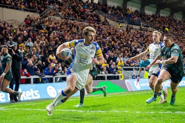 Paul Momirovski scores the second of his two tries in Leeds Rhinos' defeat by Huddersfield Giants. Picture by Allan McKenzie/SWpix.com.