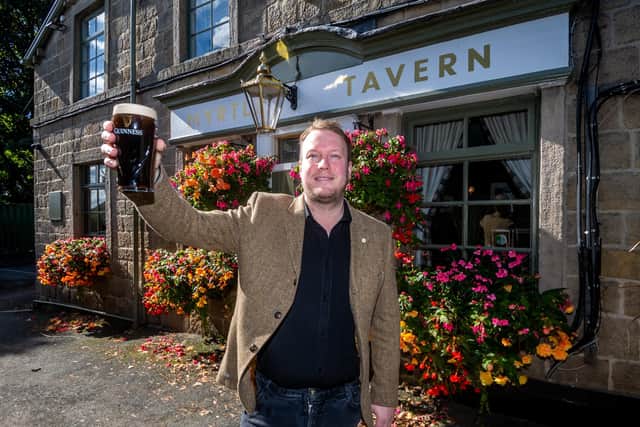Scott Westlake, landlord of the Myrtle Tavern, celebrating the announcement that his pub had been named as one of the country's best 'hidden gems'