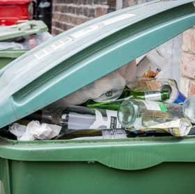 A stock image of a recycling bin.