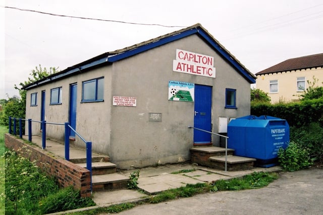 Carlton Athletic Association Football Club located off Town Street. A sign depicting a football pitch and a ball is fixed on the gable end adjacent to the door. A plaque, also on the gable end, is inscribed with the words ' In memory of Les Woolford, Founder Member of Carlton Athletic A.F.C. 1955 - 1990'.
