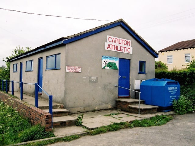 Carlton Athletic Association Football Club located off Town Street. A sign depicting a football pitch and a ball is fixed on the gable end adjacent to the door. A plaque, also on the gable end, is inscribed with the words ' In memory of Les Woolford, Founder Member of Carlton Athletic A.F.C. 1955 - 1990'.