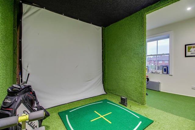 This bedroom has currently been transformed in to a golfing room.