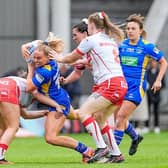 Lucy Murray is tackled by Vicky Whitfield during Leeds Rhinos' 12-6 defeat at St Helens two weeks ago. Picture by Olly Hassell/SWpix.com.