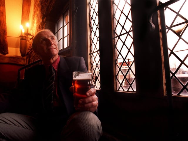 Architect and owner of The Counting House pub, Malcolm Lister, celebrates his success in February 1996 after been declared category winner in the 1995 English Heritage/CAMRA Pub Design Awards.