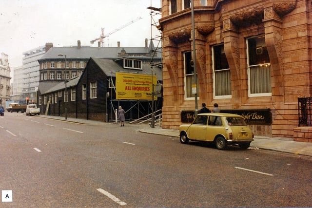King Street looking towards East Parade in April 1979. The Hotel Metropole is in the foreground right. It stands on the site of the Fourth White Cloth Hall which opened in June 1899.  Quebec House on Quebec Street is the terracotta building in the background.