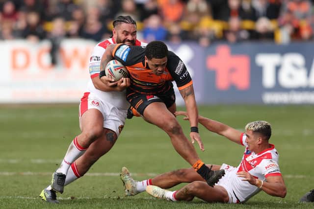 Jordan Turner tries to find a hole in the St Helens defence. (Photo: John Clifton/SWpix.com)