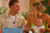Andrew Le Page and Tasha Ghouri with their "son" Leo during the baby challenge on Love Island 2022 (ITV)