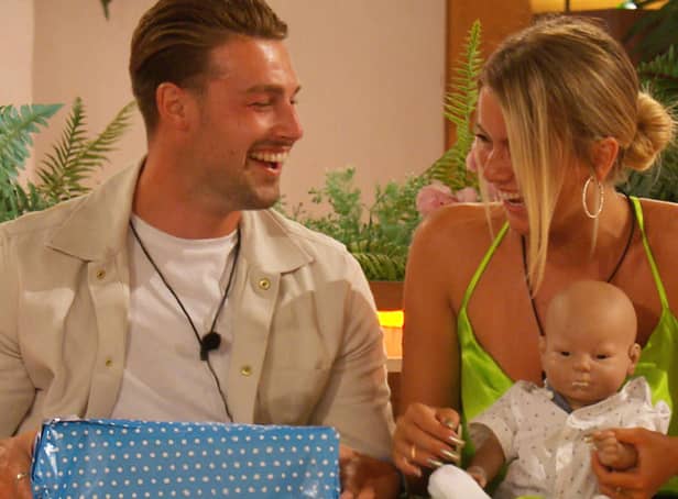 <p>Andrew Le Page and Tasha Ghouri with their "son" Leo during the baby challenge on Love Island 2022 (ITV)</p>